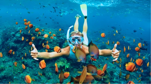 A woman scuba diving in Guam.